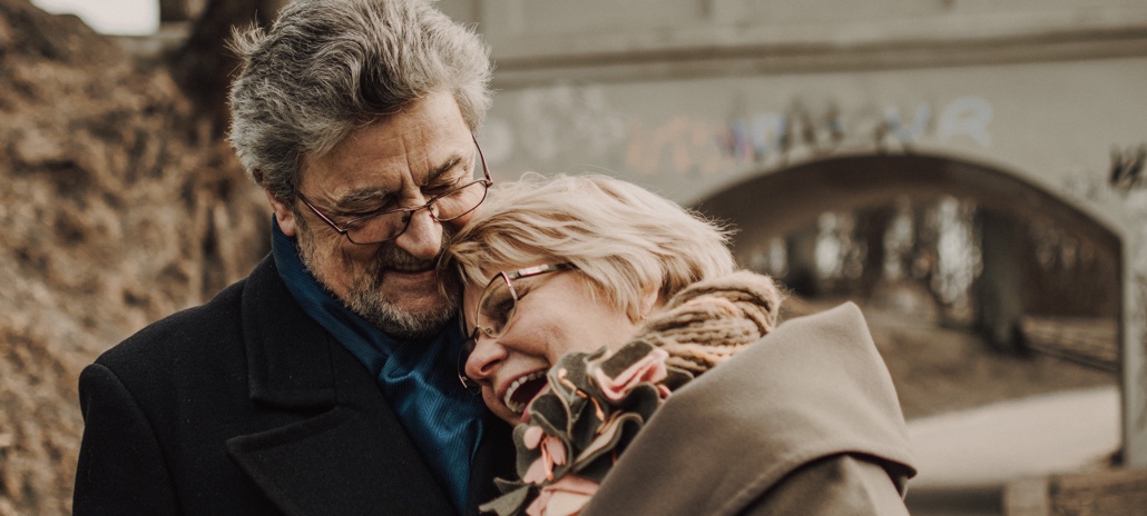 Middle-aged couple laughing together