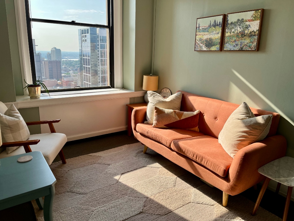 “The Orange Couch Office”