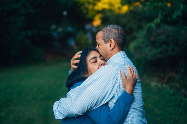 Middle-aged couple hugging