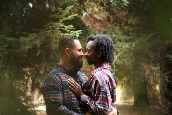 Man and woman embracing in a park